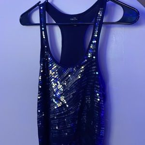 This is a sparkling blouse, small size by rue21